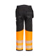 Pantaloni PW3 neri con estremità fluorescenti, con strisce riflettenti e tasche a pistola PORTWEST PW307