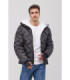WÁLD padded jacket with a hood and high collar featuring a unique sealing pattern. 12103105